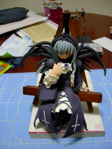 Rating: Safe Score: 0 Tags: 1girl black_dress blurry blurry_background blurry_foreground chair depth_of_field doll dress frills from_above full_body gothic_lolita hair_over_one_eye hairband indoors lolita_fashion lolita_hairband long_hair long_sleeves looking_at_viewer photo red_eyes sitting solo suigintou wings User: admin