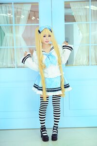 Rating: Safe Score: 0 Tags: 1girl 3d blonde_hair blue_eyes dress hat lips long_hair sailor_collar shinku solo striped striped_legwear thighhighs User: admin