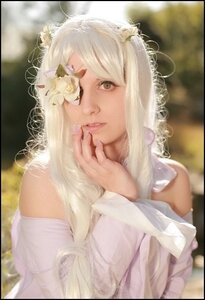 Rating: Safe Score: 0 Tags: 1girl bangs bare_shoulders black_border blonde_hair blurry border closed_mouth depth_of_field dress flower hair_ornament kirakishou letterboxed lips long_hair looking_at_viewer nose realistic solo upper_body User: admin