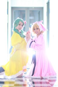 Rating: Safe Score: 0 Tags: 2girls blonde_hair blue_eyes blurry depth_of_field flower hair_ornament hatsune_miku kagamine_rin multiple_cosplay multiple_girls short_hair siblings sisters smile tagme twins User: admin
