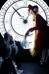 Rating: Safe Score: 0 Tags: 2girls blonde_hair clock dress flower hat long_hair long_sleeves multiple_cosplay multiple_girls tagme window User: admin