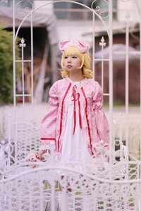 Rating: Safe Score: 0 Tags: 1girl blonde_hair blurry blurry_background blurry_foreground chromatic_aberration depth_of_field dress drill_hair flower grass hat hat_ribbon hinaichigo lips long_sleeves mob_cap photo ribbon solo User: admin