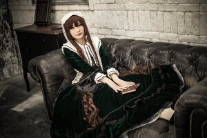 Rating: Safe Score: 0 Tags: 1girl black_legwear brown_hair couch dress green_dress green_eyes long_hair looking_at_viewer own_hands_together sitting solo suiseiseki thighhighs User: admin