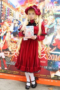 Rating: Safe Score: 0 Tags: blonde_hair blue_hair dress flower frills long_hair multiple_girls red_dress rose shinku solo User: admin