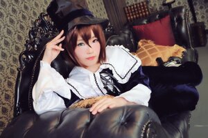 Rating: Safe Score: 0 Tags: 1girl blue_eyes brown_hair couch hair_between_eyes hat heterochromia lace lips long_sleeves looking_at_viewer short_hair solo souseiseki User: admin