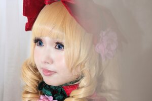 Rating: Safe Score: 0 Tags: 1girl bangs blonde_hair blue_eyes bow eyelashes flower hair_flower lips long_hair looking_at_viewer nose portrait shinku simple_background solo User: admin