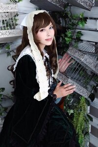 Rating: Safe Score: 0 Tags: 1girl black_dress brown_hair building dress frills heterochromia instrument lips long_hair long_sleeves looking_at_viewer plant solo suiseiseki User: admin
