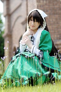 Rating: Safe Score: 0 Tags: 1girl blurry blurry_background blurry_foreground brown_hair depth_of_field dress flower green_dress lips long_hair long_sleeves looking_at_viewer outdoors smile solo suiseiseki very_long_hair User: admin