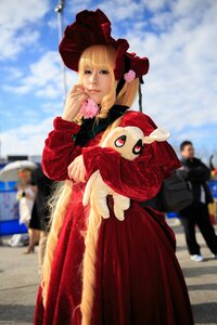 Rating: Safe Score: 0 Tags: 1girl blonde_hair blue_eyes blue_sky blurry blurry_background blurry_foreground bonnet depth_of_field dress figure long_sleeves outdoors photo red_dress shinku solo User: admin