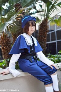 Rating: Safe Score: 0 Tags: 1girl blue_dress blue_headwear brown_hair capelet dress hat kneehighs leaf long_sleeves outdoors plant short_hair sitting solo souseiseki tree white_legwear User: admin