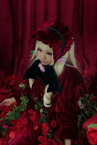 Rating: Safe Score: 0 Tags: 1girl blonde_hair bonnet curtains dress flower long_hair long_sleeves red_dress red_flower red_rose rose shinku solo User: admin