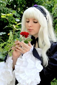 Rating: Safe Score: 0 Tags: 1girl bangs black_dress blonde_hair choker closed_eyes dress eyelashes flower frilled_sleeves frills gothic_lolita hairband holding lace lips lolita_fashion long_hair long_sleeves plant ribbon rose solo suigintou upper_body User: admin