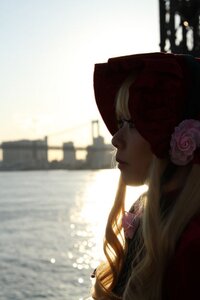 Rating: Safe Score: 0 Tags: 1girl blonde_hair blurry blurry_background blurry_foreground building depth_of_field flower from_side hair_flower hair_ornament lips long_hair profile rose shinku solo upper_body User: admin