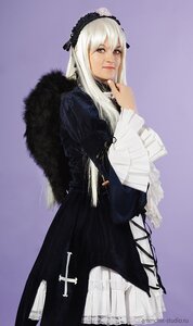 Rating: Safe Score: 0 Tags: 1girl auto_tagged closed_mouth dress frills gothic_lolita gradient gradient_background lips long_hair long_sleeves looking_at_viewer purple_background solo standing suigintou white_hair User: admin
