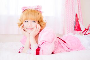 Rating: Safe Score: 0 Tags: 1girl bangs blonde_hair blue_eyes bow chin_rest hair_bow hands_on_own_face hinaichigo lips looking_at_viewer lying on_stomach pink_bow smile solo striped User: admin