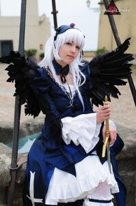 Rating: Safe Score: 0 Tags: 1girl auto_tagged blurry breasts cleavage depth_of_field dress feathers frills lips long_hair long_sleeves photo realistic silver_hair solo suigintou thighhighs User: admin