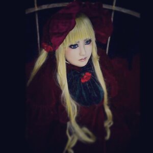 Rating: Safe Score: 0 Tags: 1girl bangs blonde_hair blue_eyes blurry closed_mouth depth_of_field dress hat lips long_hair looking_at_viewer red_headwear shinku simple_background solo umbrella upper_body User: admin
