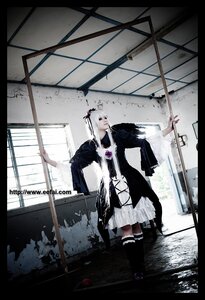 Rating: Safe Score: 0 Tags: 1girl bird black_border dress indoors letterboxed long_hair solo standing suigintou sword weapon User: admin
