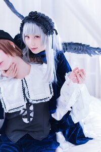Rating: Safe Score: 0 Tags: bangs closed_mouth dress frills hairband holding_hands lolita_fashion long_hair long_sleeves looking_at_viewer multiple_cosplay multiple_girls red_eyes sitting smile suigintou tagme white_hair wings User: admin