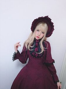 Rating: Safe Score: 0 Tags: 1girl bangs blonde_hair blue_eyes blunt_bangs bonnet closed_mouth dress flower hand_up lips long_hair long_sleeves looking_at_viewer pink_flower pink_rose red_dress rose shinku solo standing striped User: admin
