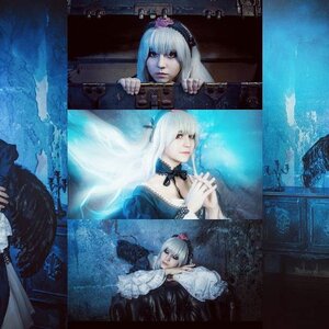 Rating: Safe Score: 0 Tags: 1girl dress hairband photo silver_hair solo suigintou water wings User: admin