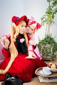 Rating: Safe Score: 0 Tags: 2girls blonde_hair blue_eyes bonnet bow cup dress food fruit long_hair multiple_cosplay multiple_girls shinku siblings sisters sitting tagme tea teacup User: admin