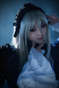 Rating: Safe Score: 0 Tags: 1girl bangs closed_mouth eyelashes hand_up lips long_hair looking_at_viewer red_eyes solo suigintou User: admin