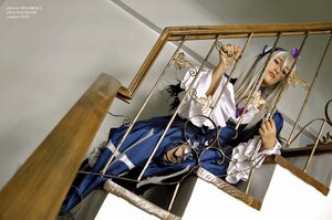 Rating: Safe Score: 0 Tags: 1boy 1girl dress frills hair_ornament long_hair nail_polish sitting solo suigintou wide_sleeves User: admin