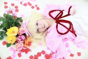 Rating: Safe Score: 0 Tags: 1girl blonde_hair blue_eyes dress flower hinaichigo lips lying petals pink_rose red_ribbon ribbon rose short_hair solo striped vertical_stripes User: admin