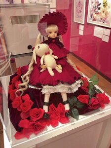 Rating: Safe Score: 0 Tags: 1girl blonde_hair doll dress flower red_dress red_flower red_rose rose shinku sitting solo stuffed_animal teddy_bear User: admin