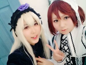 Rating: Safe Score: 0 Tags: 2girls closed_mouth gothic_lolita hairband lips lolita_fashion lolita_hairband long_hair long_sleeves looking_at_viewer multiple_cosplay multiple_girls photo red_eyes ribbon smile suigintou tagme white_hair User: admin