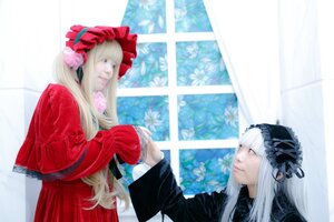 Rating: Safe Score: 0 Tags: 2girls 91076 bangs blonde_hair blue_eyes bonnet dress flower long_hair long_sleeves multiple_cosplay multiple_girls red_dress shinku silver_hair suigintou tagme very_long_hair window User: admin
