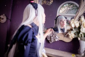 Rating: Safe Score: 0 Tags: blurry blurry_background blurry_foreground depth_of_field dress flower frills indoors long_hair long_sleeves mirror photo ribbon silver_hair solo suigintou User: admin