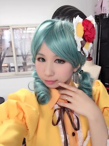 Rating: Safe Score: 0 Tags: 1girl aqua_eyes aqua_hair drill_hair finger_to_mouth green_eyes indoors jewelry kanaria lips looking_at_viewer nail_polish photo ribbon shirt smile solo upper_body User: admin