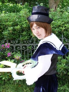 Rating: Safe Score: 0 Tags: 1girl brown_eyes brown_hair capelet dress flower hat long_sleeves looking_back nature outdoors plant short_hair smile solo souseiseki top_hat tree User: admin
