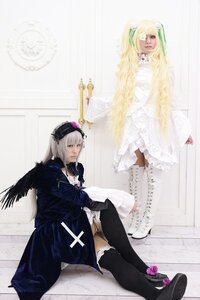 Rating: Safe Score: 0 Tags: 2girls black_wings blonde_hair dress frills long_hair long_sleeves multiple_cosplay multiple_girls silver_hair sitting suigintou tagme thighhighs wings User: admin