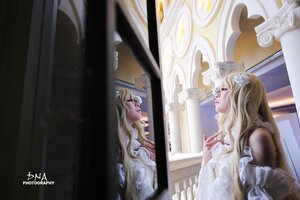 Rating: Safe Score: 0 Tags: 1girl bare_shoulders blonde_hair dress flower hair_flower hair_ornament indoors kirakishou long_hair mirror necklace profile reflection solo tiara wavy_hair white_dress window User: admin
