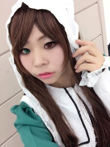 Rating: Safe Score: 0 Tags: 1girl brown_hair closed_mouth eyelashes fur_trim green_eyes heterochromia lips looking_at_viewer makeup photorealistic red_eyes solo suiseiseki towel upper_body User: admin