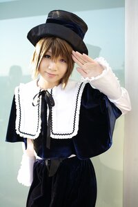 Rating: Safe Score: 0 Tags: 1girl black_dress black_ribbon blonde_hair blue_eyes capelet dress hat lace lips lolita_fashion long_sleeves looking_at_viewer realistic ribbon short_hair smile solo souseiseki top_hat User: admin