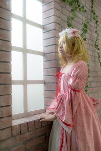 Rating: Safe Score: 0 Tags: 1girl blonde_hair brick_wall dress flower hair_flower hinaichigo lips long_hair long_sleeves solo standing window User: admin