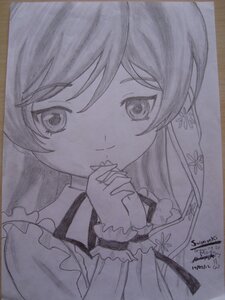 Rating: Safe Score: 0 Tags: 1girl artist_name closed_mouth dated graphite_(medium) greyscale hands_clasped image interlocked_fingers long_hair looking_at_viewer monochrome own_hands_together photo shikishi signature smile solo suiseiseki traditional_media upper_body User: admin