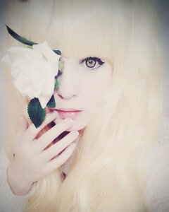 Rating: Safe Score: 0 Tags: 1girl bangs close-up closed_mouth eyelashes face fingernails flower kirakishou lips looking_at_viewer solo User: admin