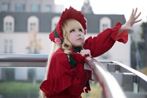 Rating: Safe Score: 0 Tags: 1girl blonde_hair blue_eyes blurry blurry_background blurry_foreground bonnet building depth_of_field dress drill_hair flower long_sleeves motion_blur outdoors outstretched_arm photo red_dress rose shinku solo User: admin