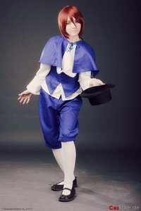 Rating: Safe Score: 0 Tags: 1boy androgynous artist_name black_footwear capelet full_body hat hat_removed headwear_removed holding_clothes long_sleeves looking_at_viewer red_hair short_hair shorts solo souseiseki standing white_legwear User: admin