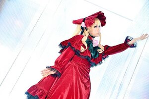 Rating: Safe Score: 0 Tags: 1girl blonde_hair blue_eyes bonnet dress flower frills long_hair long_sleeves outstretched_arm red_dress rose shinku solo standing User: admin