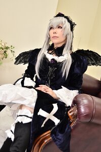 Rating: Safe Score: 0 Tags: 1girl chair dress frilled_sleeves frills gothic_lolita lolita_fashion long_hair long_sleeves silver_hair sitting solo suigintou wings User: admin