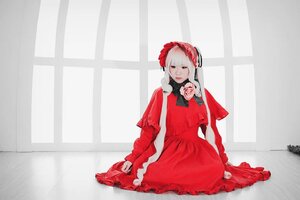 Rating: Safe Score: 0 Tags: 1girl bonnet curtains dress frills joints long_sleeves red_dress shinku sitting solo window User: admin