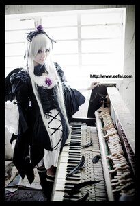 Rating: Safe Score: 0 Tags: 1girl auto_tagged black_border blue_eyes dress flower hair_ornament letterboxed lips solo suigintou User: admin