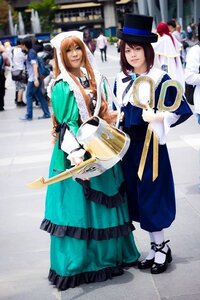 Rating: Safe Score: 0 Tags: 3d blonde_hair blurry blurry_background blurry_foreground brown_hair depth_of_field dress frills hat long_hair multiple_cosplay multiple_girls photo shoes short_hair standing tagme white_legwear User: admin