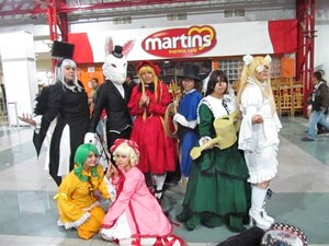 Rating: Safe Score: 0 Tags: 6+boys 6+girls black_hair blonde_hair dress hat long_hair multiple_boys multiple_cosplay multiple_girls tagme User: admin